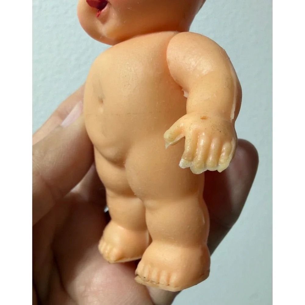 Vintage Japan Rubber Baby Doll Squeeze Toy Top Knot Bun Blue Eyes Kitsch 4.75in